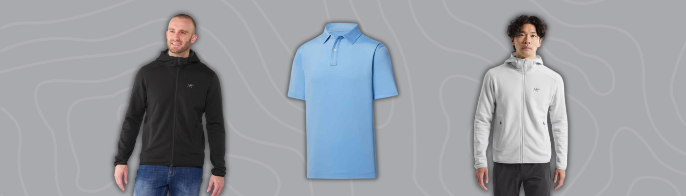 Custom corporate gifts apparel, including Arc'teryx hoody, quarter zip pullover, and blue polo shirt on gray background