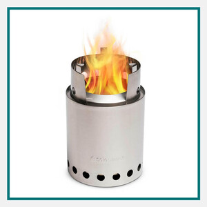 Stainless steel Solo Stove outdoor fire pit with bright flames and circular air vents, shown against a white background with a teal border.