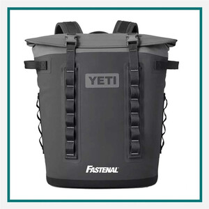 Gray YETI backpack cooler with black straps and a Fastenal logo on the front, shown against a white background with a teal border.