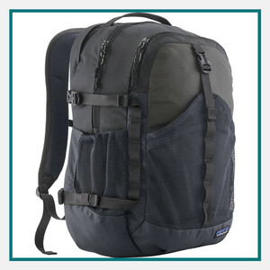 Patagonia 30L Refugio Daypack in black with padded shoulder straps, dual zippered compartments, side mesh pockets, compression straps, and Patagonia logo.