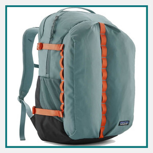 Patagonia 32L Refugio Daypack in light teal with orange webbing accents, padded shoulder straps, side mesh pocket, and Patagonia logo.
