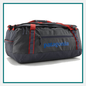 Patagonia 55L Black Hole Duffel Bag in black with red accents, durable construction, zippered compartments, carry handles, and Patagonia branding.
