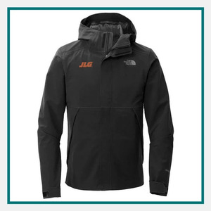 The North Face Men's Apex DryVent Jacket in black with an attached hood, full-zip front, adjustable cuffs, and embroidered chest logos.