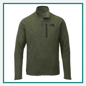 The North Face Men's Skyline Full-Zip Fleece Jacket in olive green with a stand collar, full-zip front, zippered chest pocket, and The North Face logo on the chest.