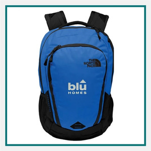 The North Face Connector Backpack in blue and black with multiple zippered compartments, side pockets, padded shoulder straps, and Blu Homes and The North Face logos.