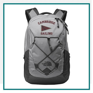The North Face Groundwork Backpack in gray and black with padded shoulder straps, front bungee detailing, side pockets, Cambridge Sailing embroidery, and The North Face logo.
