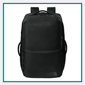 The North Face 35L Travel Backpack in black with padded shoulder straps, multiple zippered compartments, side carry handles, and The North Face logo on the front.