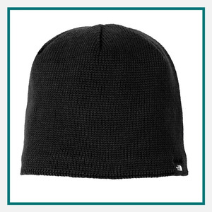 The North Face Mountain Beanie in black with a ribbed knit design and a small The North Face logo tag near the hem.