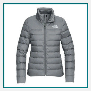 The North Face Ladies Down Hybrid Jacket in gray with quilted insulation, full-zip front, stand collar, and a fitted silhouette.