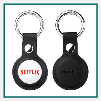 Black genuine leather Apple AirTag closed back protective keychain shown with attached metal ring.