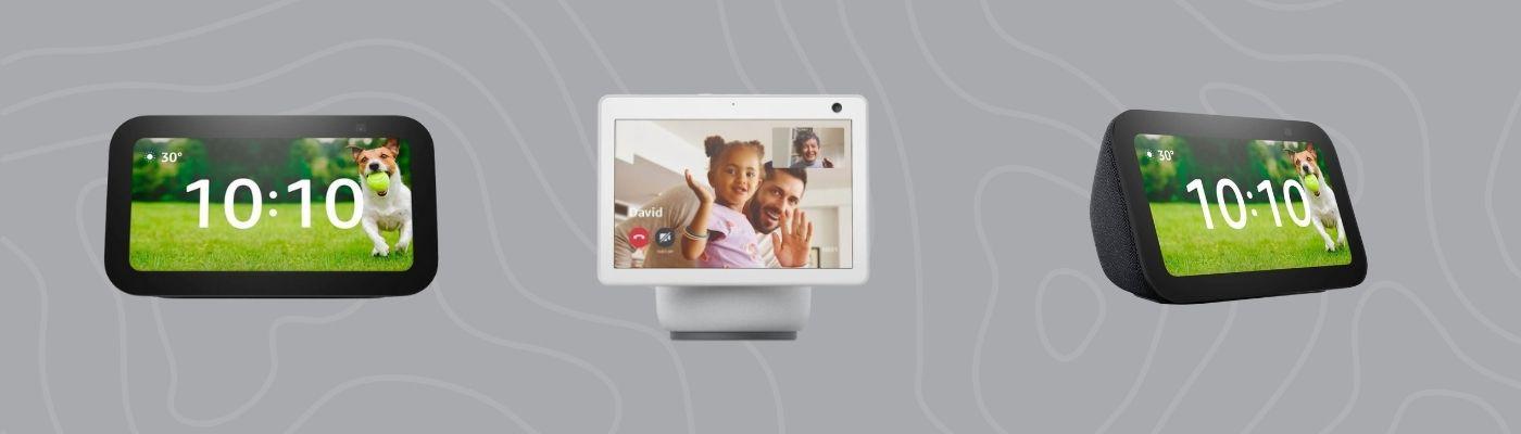 Smart home tech gifts, including a compact smart display showing a clock screen with a dog and a larger video-calling display on a grey, patterned background.