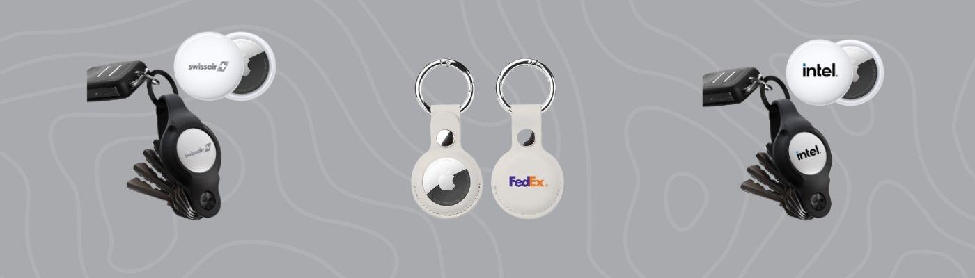 Smart tracking tech gifts, including branded key finders, compact item trackers, and leather AirTag holders, are displayed on a dark, patterned background.