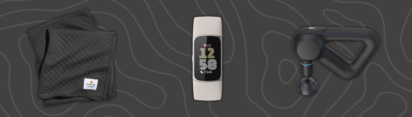 Tech gift set with HyperGear PowerFold 4-in-1 wireless charging stand, Beats Pill portable speaker, and Apple AirPods Max headphones on dark background.