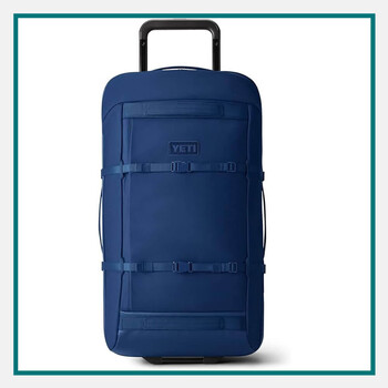 Navy blue 29‑inch wheeled suitcase with retractable telescoping handle, side and top carry handles, and adjustable external compression straps.