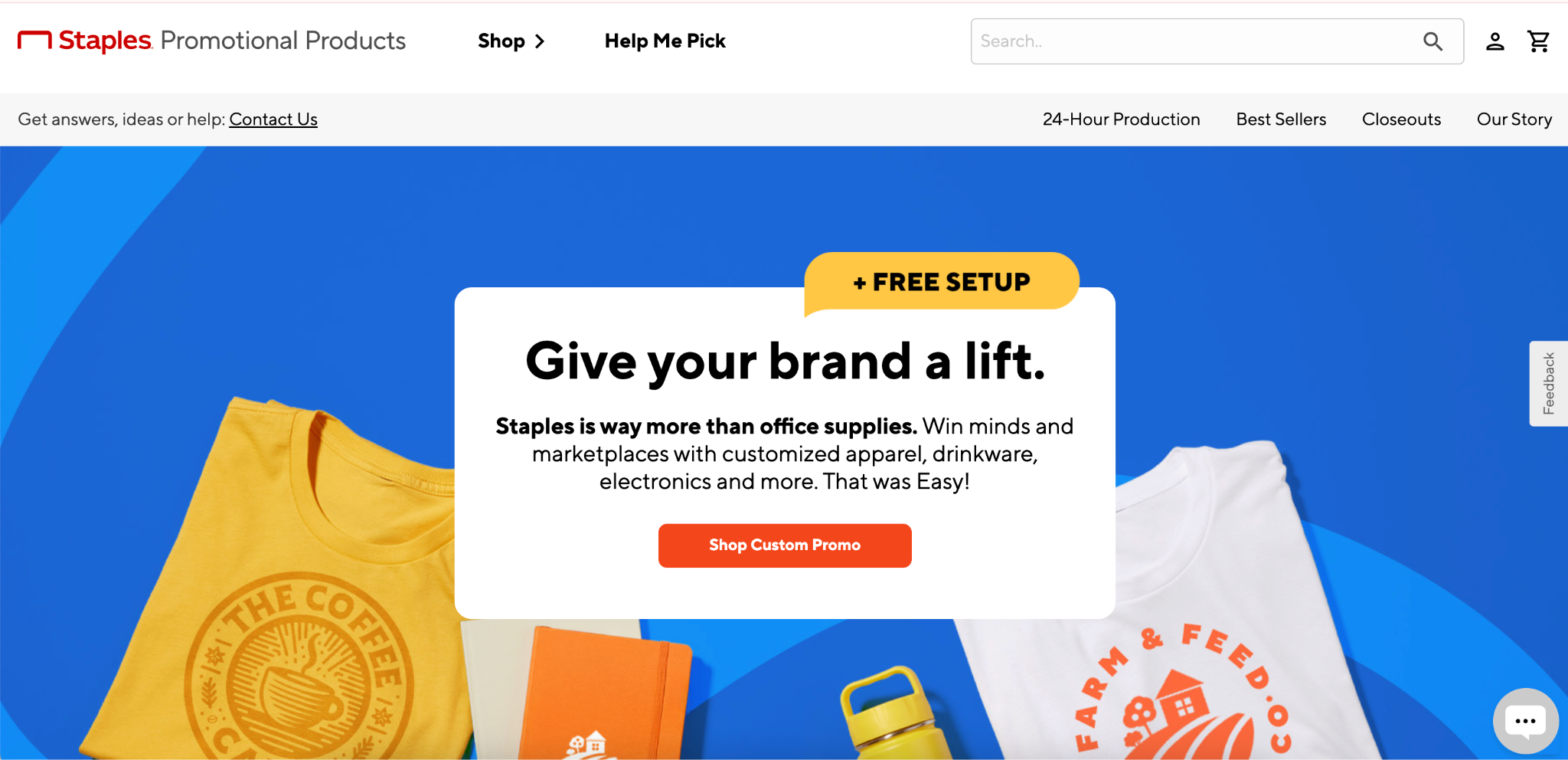 Staples Promotional Products website hero banner featuring custom apparel, notebooks, and drinkware for brand marketing.